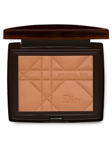 Just in time for resort season.The first bronzing powder that actually works to improve skin color and quality for a natural, vacation-fresh, tanned look, all year long. Formulated with Dior's exclusive Sun Minerals Technology, new Original Tan blends seamlessly with your skin. Silky smooth and flawless. Four sunkissed shades stamped in Dior's famous cannage quilt pattern in gleaming black compacts. So sun-sational. So Dior. Just in time for resort season.The first bronzing powder that actually works to improve skin color and quality for a natural, vacation-fresh, tanned look, all year long. Formulated with Dior's exclusive Sun Minerals Technology, new Original Tan blends seamlessly with your skin. Silky smooth and flawless. Four sunkissed shades stamped in Dior's famous cannage quilt pattern in gleaming black compacts. So sun-sational. So Dior.
