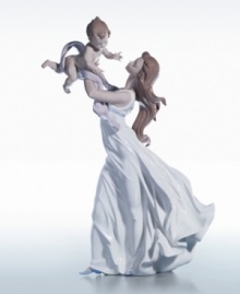 A beautifully detailed evocation of a connection that goes beyond words. This figurine is crafted of fine porcelain, delicate painted hues, and a high gloss finish, so exquisite you can just about feel the cool breeze against your skin. Measures 18.5 x 11.5. A beautifully detailed evocation of a connection that goes beyond words. This figurine is crafted of fine porcelain, delicate painted hues, and a high gloss finish, so exquisite you can just about feel the cool breeze against your skin. Measures 18.5 x 11.5.