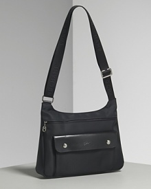 Longchamp Planete crossbody bag in nylon with single adjustable crossbody strap, silvertone hardware and leather trim. Features front zip closure and front exterior flap pocket. Longchamp Planete crossbody bag in nylon with single adjustable crossbody strap, silvertone hardware and leather trim. Features front zip closure and front exterior flap pocket.