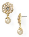 Carolee crafts a feminine statement with this pair of delicate pearl and crystal drop earrings, accented by elegant gold-plated floral detailing.