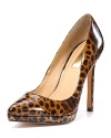 A classic platform pump in provocative leopard printed patent. From Report Signature.