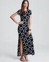 Popping with an optic print, this MICHAEL Michael Kors maxi dress infuses your off-duty look with modern femininity. Add a printed tote for on-trend mixed prints.