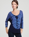 An electric tie-dye print enlivens this C&C California top, rendered in a flattering dolman-sleeve design.