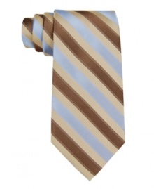 In a traditional repp stripe pattern, this Calvin Klein tie recalls classic haberdashery style. In a traditional repp stripe pattern, this Calvin Klein tie recalls classic haberdashery style.