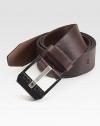 A modern style in smooth leather with a polished logo buckle.LeatherAbout 2½ wideImported