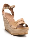 It's all in the details with IVANKA TRUMPS's Cadie wedges, from the natural stacked wedge to the snake-embossed trim.