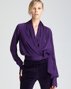 Rachel Zoe's scarf top in swathes of silk makes for luxe dressing. A feminine bow finishes the look.