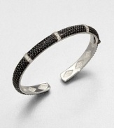 From the Soho Collection. Five rows of rich black spinel accented with dazzling white sapphires set in sterling silver.Black spinel and white sapphireSterling silverDiameter, about 2.75Hinged closureImported 