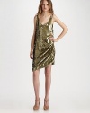 Diagonal bands of sequins drape gently toward one hip in this scintillating design.Sleeveless pullover Scoop neckline Side draping About 36 from shoulder to hem Silk; dry clean Imported