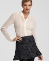 Redefine a workday staple with this sheer Theory shirt, complete with sharp darts and modern slits at the sleeves.