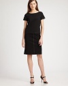 This classic pencil silhouette is embellished with edgy bands of leather trim.Front welt pocketsLeather trimConcealed back zipFully linedAbout 23 long84% rayon/11% nylon/5% elastaneDry cleanImportedModel shown is 5'11½ (181cm) wearing US size 4. 
