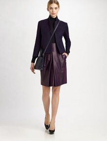 Luxurious, rich purple leather in combination with stitched-down pleats make this the perfect style for a polished feminine woman. Front pleatsBack zipLinedAbout 24 longLeatherDry cleanImported of Italian fabricModel shown is 5'11 (180cm) wearing US size 4. Luxurious, rich purple leather in combination with stitched-down pleats make this the perfect style for a polished feminine woman. Front pleatsBack zipLinedAbout 24 longLeatherDry cleanImported of Italian fabricModel shown is 5'11 (180cm) wearing US size 4.