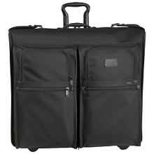 Slim and sleek, this garment cover is an effortless way to carry and protect a single suit or garment. It features an outside U-zip pocket for a travel kit or shoes and interior accessories pockets. Made from Tumi's signature ballistic nylon, it comes with its own hanger with a comfortable leather handle grip.Dimensions: 21 x 23.5 - H xW Slim and sleek, this garment cover is an effortless way to carry and protect a single suit or garment. It features an outside U-zip pocket for a travel kit or shoes and interior accessories pockets. Made from Tumi's signature ballistic nylon, it comes with its own hanger with a comfortable leather handle grip.Dimensions: 21 x 23.5 - H xW