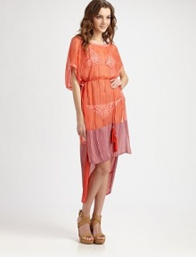 An ethereal design with down-to-earth style, thanks to classic stripes, exotic tassels and a fashion-forward high-low hem.Round neckKimono sleevesSolid trimSelf-tie tassel beltHigh-low hemSilkHand washImported An ethereal design with down-to-earth style, thanks to classic stripes, exotic tassels and a fashion-forward high-low hem.Round neckKimono sleevesSolid trimSelf-tie tassel beltHigh-low hemSilkHand washImported