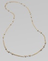 Strands of delicate golden chains gracefully connect textured golden beads and lustrous glass pearls in this elegant design that's long enough to double.Glass pearlsBrassLength, about 42Lobster claspImported