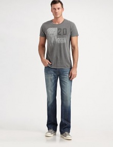 A slim-fitting classic with bootcut legs in medium-washed denim, lightly faded at the points of wear for the look of a longtime favorite. Five-pocket style Inseam, about 34 Cotton Machine wash Imported 