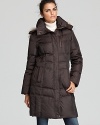 Cozy down gets a luxurious lift with plush fur details and a removable hood on this Marc New York coat.