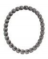 Simply Star Struck. Eliot Danori's unique statement necklace shines like the night sky. Patterns of sparkling round-cut crystals dust a black backdrop of anthracite tone mixed metal. Approximate length: 16 inches.