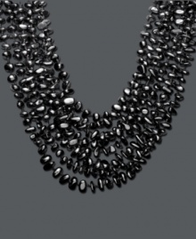 Let eight luxurious layers adorn your neckline. Silky onyx chips (6-8 mm) form eight graduated strands that make a bold, stylish statement. Approximate length: 18 inches. Let eight luxurious layers adorn your neckline. Silky onyx chips (6-8 mm) form eight graduated strands that make a bold, stylish statement. Approximate length: 18 inches.