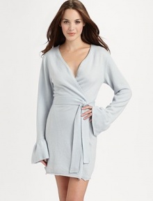 A flattering style with playfully romantic ruffled cuffs in luxuriously soft cashmere. V-neckLong sleeves with ruffled cuffsWrap front closureTie beltRolled hemAbout 36 from shoulder to hemCashmereDry cleanImported A flattering style with playfully romantic ruffled cuffs in luxuriously soft cashmere. V-neckLong sleeves with ruffled cuffsWrap front closureTie beltRolled hemAbout 36 from shoulder to hemCashmereDry cleanImported