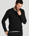 Handsome as ever, the classic V-neck in uncommonly soft cashmere ensures a powerful presentation that expresses style and refinement. Combine with a button-down and luxe silk tie for a dynamic ensemble.