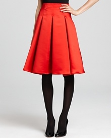 Graceful pleats create feminine appeal on this day-to-dinner Armani Collezioni skirt.