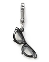 Charm them. Juicy Couture's silver-plated token is a chic way to wear your cat-eye shades at night.