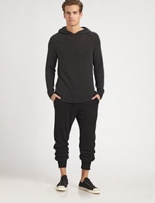 A classic hoodie gets a luxe update in a lightweight silk blend for a ruggedly handsome ensemble.Attached hoodLong raglan sleeves55% silk/45% cottonHand washImported