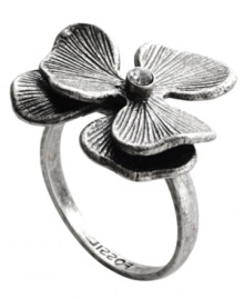 Tropically trendy. Fossil's floral-theme ring shines with the addition of a clear crystal detail at center. Crafted in vintage silver tone mixed metal. Size 7. Tropically trendy. Fossil's floral-theme ring shines with the addition of a clear crystal detail at center. Crafted in vintage silver tone mixed metal. Size 7.