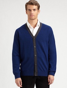 A smart, preppy layer in soft merino wool with an easy button front and striking contrast border.V-neckButton frontLong sleevesMerino woolHand washImported