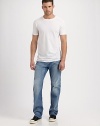 Light-blue wash, and the right amount of distressing lends a laid-back, easygoing feel to this classic straight-fit denim. style.Five-pocket styleInseam, about 34CottonMachine washImported