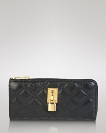 A gilded lock keeps your cash, cards and coins stylishly protected in this Marc Jacobs quilted wallet that shows off with a high-glass lacquered finish. A gilded lock keeps your cash, cards and coins stylishly protected in this Marc Jacobs quilted wallet that shows off with a high-glass lacquered finish.