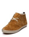 A modern chukka in soft suede, crafted for a lean profile, smooth lines and a comfy rubber sole.