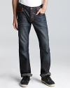 The Barracuda is a lean, straight-leg jean fitted with darting at the inner leg and antiqued brass hardware for a carefully curated casual look.