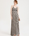 Elongate your look with this striped, empire waist maxi with an elastic band on the back. An instant wardrobe staple--wear it from day to night, all season long.