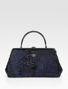 Astrakhan lamb bag with leather trim.Leather top handle, 4½ dropPush-lock closureProtective metal feetOne inside zip pocketTwo inside open pocketsLeather lining14½W X 8½H X 7DMade in Italy Astrakhan lamb bag with leather trim.Leather top handle, 4½ dropPush-lock closureProtective metal feetOne inside zip pocketTwo inside open pocketsLeather lining14½W X 8½H X 7DMade in Italy