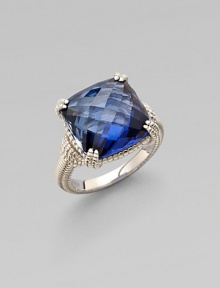 Cushion-cut blue corundum sparkles in a delicate sterling silver setting.Blue corundumSterling silverWidth, about ½Imported Cushion-cut blue corundum sparkles in a delicate sterling silver setting.Blue corundumSterling silverWidth, about ½Imported