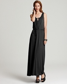 A dramatic floor-sweeping silhouette and an edgy crossed front detail lend understated glamour to this Three Dots maxi dress. A dramatic floor-sweeping silhouette and an edgy crossed front detail lend understated glamour to this Three Dots maxi dress.