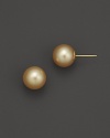 Elegant South Sea pearls, set in 14K. yellow gold.