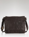 Frye loves the rugged look, and so do we. The classic messenger bag is rendered in distressed leather for a cool, road-tested look and feel.