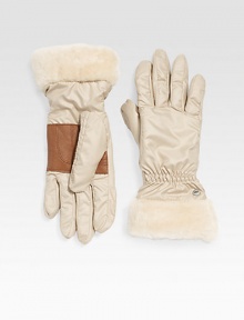 Keep your hands extra warm in this stylish nylon design with plush shearling cuff and easy-grip deerskin palm. Dyed sheepskin shearlingCinched wristAbout 10½ longPolyester; dry cleanImportedFur origin: Spain Keep your hands extra warm in this stylish nylon design with plush shearling cuff and easy-grip deerskin palm. Dyed sheepskin shearlingCinched wristAbout 10½ longPolyester; dry cleanImportedFur origin: Spain