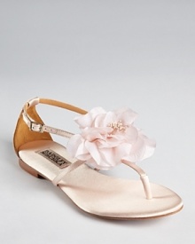 Who says flats can't be dressed up? These floral Badgley Mischka sandals look as perfect at formal events as high heels--a garden party or beach wedding's dream.