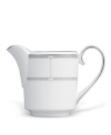 Inspired by the chic London neighborhood, the Waterford Sloane Square creamer is as chic and simple as its namesake, featuring a tailored band and platinum dot details.