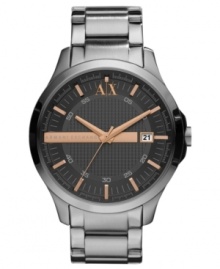 AX Armani Exchange adds warmth to a classic watch design with rose-gold tone accents.