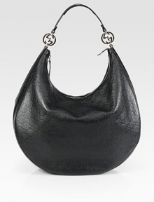 Large, leather bag in an interlocking logo pattern with nickel hardware and a single shoulder strap. Shoulder strap, 8 drop Zipper closure Inside zip pocket Two open pockets Fully lined 15W X 11¾H X 6D Made in Italy Large, leather bag in an interlocking logo pattern with nickel hardware and a single shoulder strap. Shoulder strap, 8 drop Zipper closure Inside zip pocket Two open pockets Fully lined 15W X 11¾H X 6D Made in Italy