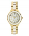 Light up your look with this luminous watch by Style&co. White and gold tone mixed metal bracelet and round gold tone case with black bezel. Glossy white dial features applied gold tone numerals, minute track, three hands and logo. Quartz movement. Splash resistant. Two-year limited warranty.