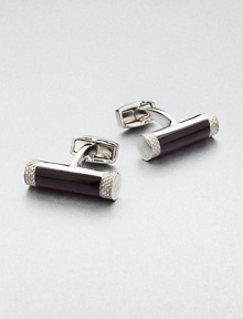 Fiber optic glass and brass cuff links lend undeniable style to any dress wardrobe.Brass/glassAbout ¼ diam.Made in the United Kingdom Fiber optic glass and brass cuff links lend undeniable style to any dress wardrobe.Brass/glassAbout ¼ diam.Made in the United Kingdom