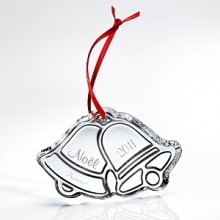 Appropriately designed by Claus Harttung, this festive Jingle Bells ornament is engraved with Noel 2011 Appropriately designed by Claus Harttung, this festive Jingle Bells ornament is engraved with Noel 2011