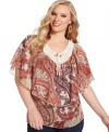 Be an image of boho-chic with Cha Cha Vente's flutter sleeve plus size top, accented by crochet trim and ruffles.