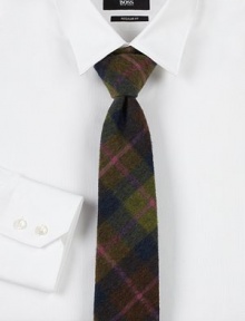 Updated dress staple for the modern man, handwoven with a rich plaid pattern in fine wool.WoolDry cleanMade in USA